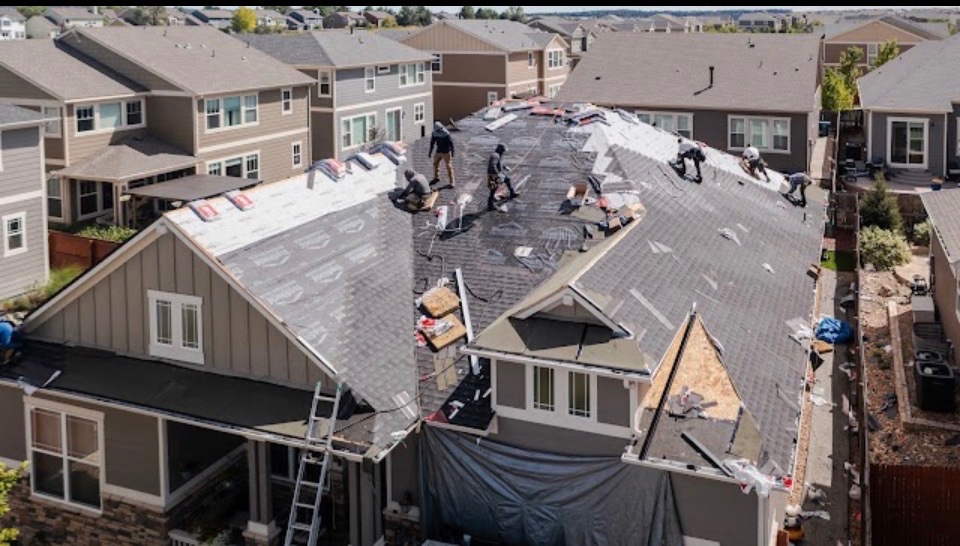 Professional Knights Restoration roofing crew installing a residential roof